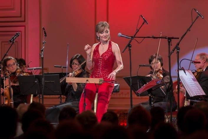 Hungarian musician Katica Illényi playing the theremin during a show.